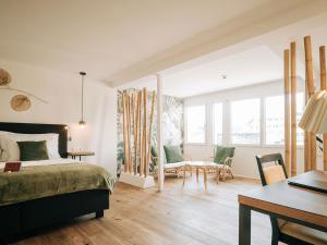 Ліжко або ліжка в номері Hotel Krone Thun