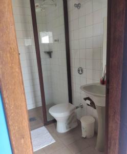 a bathroom with a toilet and a sink at Das Marias Hostel in Lagoa Santa