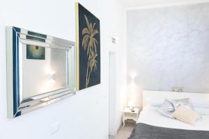 A bed or beds in a room at Trastevere Blue King Studio Suite - Top Collection