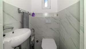 Koupelna v ubytování APARTMAN GRADINA