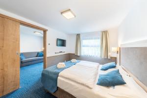 Postel nebo postele na pokoji v ubytování Botel Racek