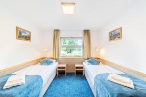 Postel nebo postele na pokoji v ubytování Botel Racek