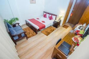 Ένα ή περισσότερα κρεβάτια σε δωμάτιο στο SKS Inn