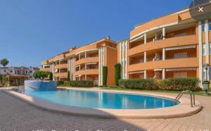Bazén v ubytovaní Meernahes Ferienapartment Elia Dénia alebo v jeho blízkosti
