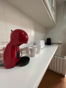 A kitchen or kitchenette at Preciosa vivienda con gran terraza, parking gratis