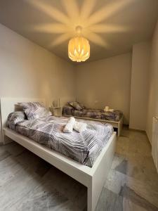 A bed or beds in a room at Preciosa vivienda con gran terraza, parking gratis