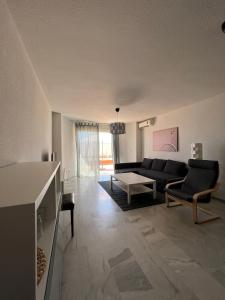 A seating area at Preciosa vivienda con gran terraza, parking gratis