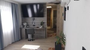 TV a/nebo společenská místnost v ubytování Hotel Wippertal - voll klimatisiert