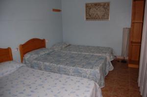 Postel nebo postele na pokoji v ubytování Casa Rural Consuelo + 19 fotografií