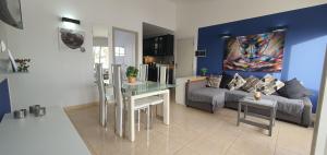 Posezení v ubytování La Rosa de los vientos luxury apartment