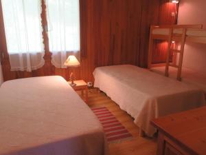 Tempat tidur dalam kamar di Appartement Châtel, 2 pièces, 4 personnes - FR-1-198-176