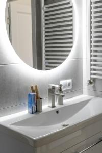 Ванна кімната в RentWill apartments Gold