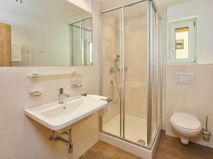 Kúpeľňa v ubytovaní Appartement Gästehaus Bergkristall + 28 fotografií