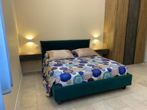 Postel nebo postele na pokoji v ubytování B&B Mercadante