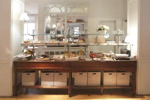 a display case in a store filled with food at Ciutat de Girona in Girona
