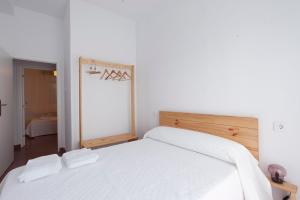 Posteľ alebo postele v izbe v ubytovaní Precioso y luminoso apartamento Calle Corredera. Casco Histórico