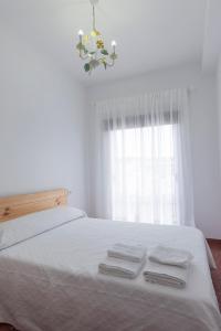 Posteľ alebo postele v izbe v ubytovaní Precioso y luminoso apartamento Calle Corredera. Casco Histórico