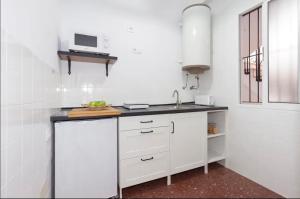 Kuchyňa alebo kuchynka v ubytovaní Precioso y luminoso apartamento Calle Corredera. Casco Histórico