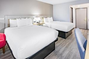 Krevet ili kreveti u jedinici u okviru objekta Wingate by Wyndham Fishkill