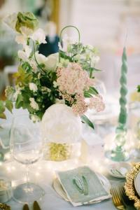 a table with a vase filled with flowers on it at Napoleon Chateau Luxuryapartment for 18 guests with Pool near Paris! in Saint-Jean-aux-Bois +94 photos