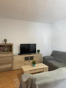Televízia a/alebo spoločenská miestnosť v ubytovaní CASA SUROESTE