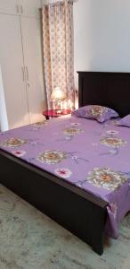 Cama ou camas em um quarto em Sri Krishna Palace