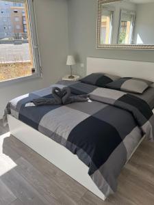 Una cama o camas en una habitación de App 1 Mulhouse centre , 6 personnes