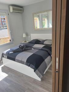 Una cama o camas en una habitación de App 1 Mulhouse centre , 6 personnes