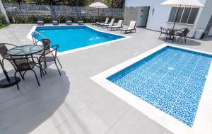 Πισίνα στο ή κοντά στο GHL Hotel Neiva