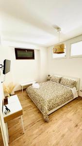 Postel nebo postele na pokoji v ubytování The Mule Apartment
