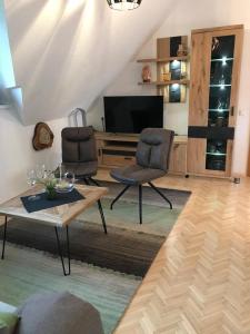 TV a/nebo společenská místnost v ubytování Klopeinerperle + 18 fotografií