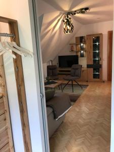 Telewizja i/lub zestaw kina domowego w obiekcie Klopeinerperle