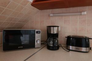 Kuchnia lub aneks kuchenny w obiekcie Teubel apartman 5