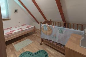 A bed or beds in a room at Family friendly house with a parking space Donja Stubica, Zagorje - 19236