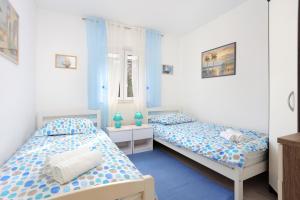 Fotografia z galérie ubytovania Family friendly house with a parking space Trogir - 19247 v Trogiri