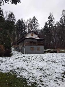 a house in a field with snow on the ground at Family friendly house with a parking space Garesnica, Bjelovarska - 19166 in Garešnica