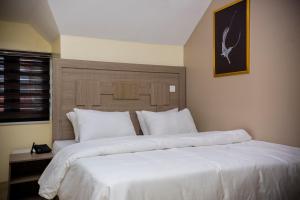 Katil atau katil-katil dalam bilik di MITOS LUXURY SUITES (BODE THOMAS)
