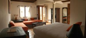 Ліжко або ліжка в номері Hotel Plaza Yat Balam