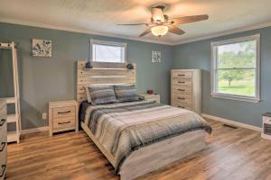 a bedroom with a bed and a ceiling fan at Berryville Home Near Wineries Mountain Views in Berryville