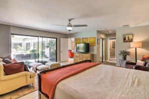 a bedroom with a large bed and a tv at Pool, Grill and Game Room Bermuda Dunes Oasis in Bermuda Dunes +32 photos