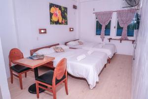 Ένα ή περισσότερα κρεβάτια σε δωμάτιο στο Sea Horse Guest House