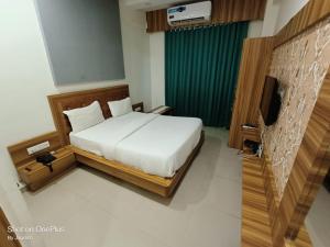 Postel nebo postele na pokoji v ubytování Hotel Asopalav