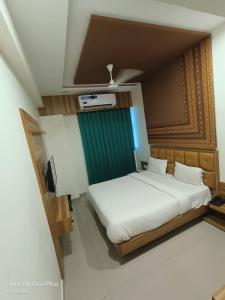 Postel nebo postele na pokoji v ubytování Hotel Asopalav