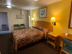 Postel nebo postele na pokoji v ubytování RANGER MOTEL