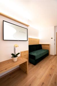 Posteľ alebo postele v izbe v ubytovaní Garni Hotel and Apartments Wildbach