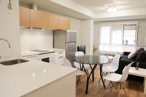 Η κουζίνα ή μικρή κουζίνα στο APARTAMENTO BARRIO DE LA ARENA +8 φωτογραφίες