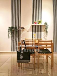 a dining room with a table and a bench at Colour-Theme Designed, Private Studio Home, Cybersquare 27B Cyberjaya, Flexihome-MY in Cyberjaya