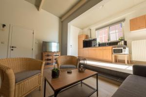 Kuchyň nebo kuchyňský kout v ubytování Vakantiewoningen Pomona