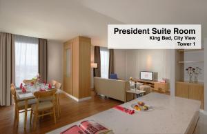 Postel nebo postele na pokoji v ubytování Swiss-Belinn Singkawang