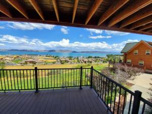 a view from the deck of a home with a view at Harbour Village Retreat in Garden City
